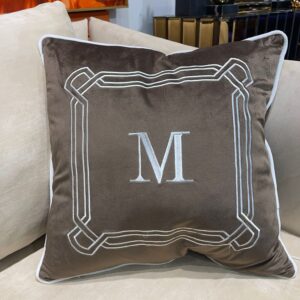 Brown M Throw pillow